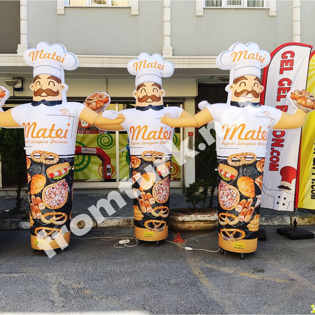 Inflatable chef balloon used in front of a bakery or café to promote fresh pastries and specials.