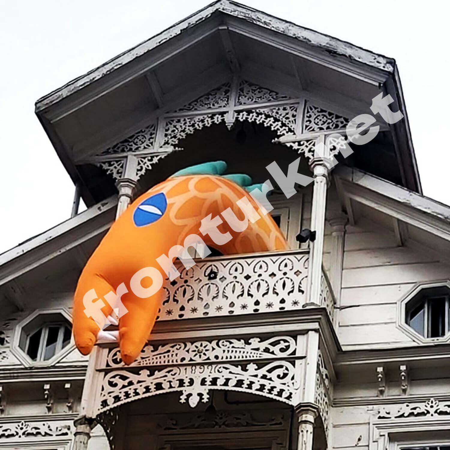 Colorful dragon inflatable balloon displayed at a cultural festival or event.