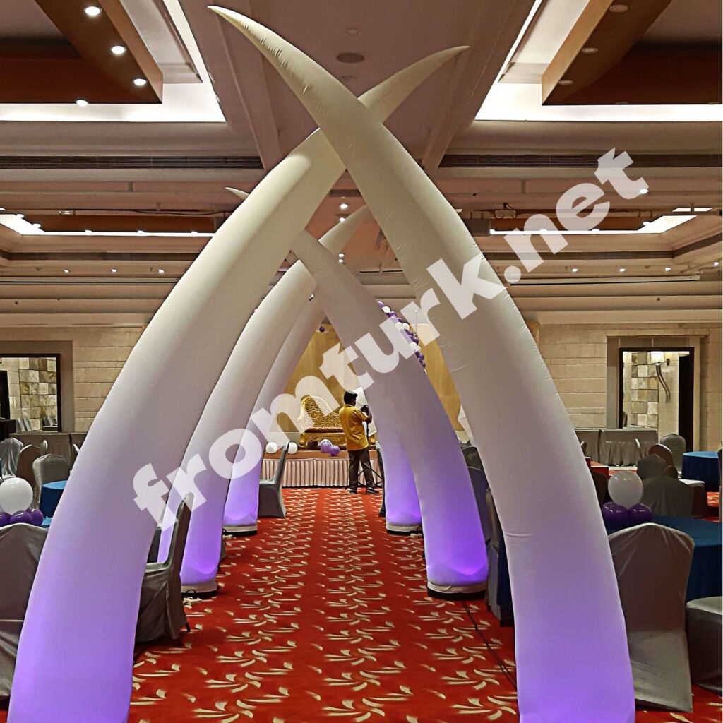 Branded ivory inflatable balloon displayed at a trade show or corporate event