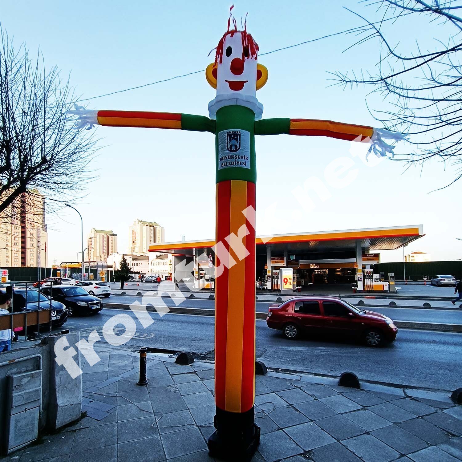 Inflatable tube man placed in front of a retail store to attract customers