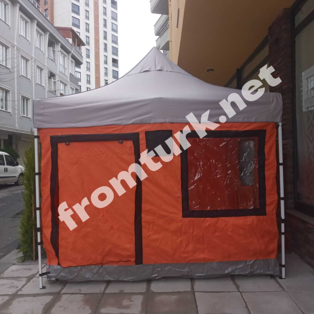 Custom-branded closed inflatable spider tent with company logo at a corporate event.