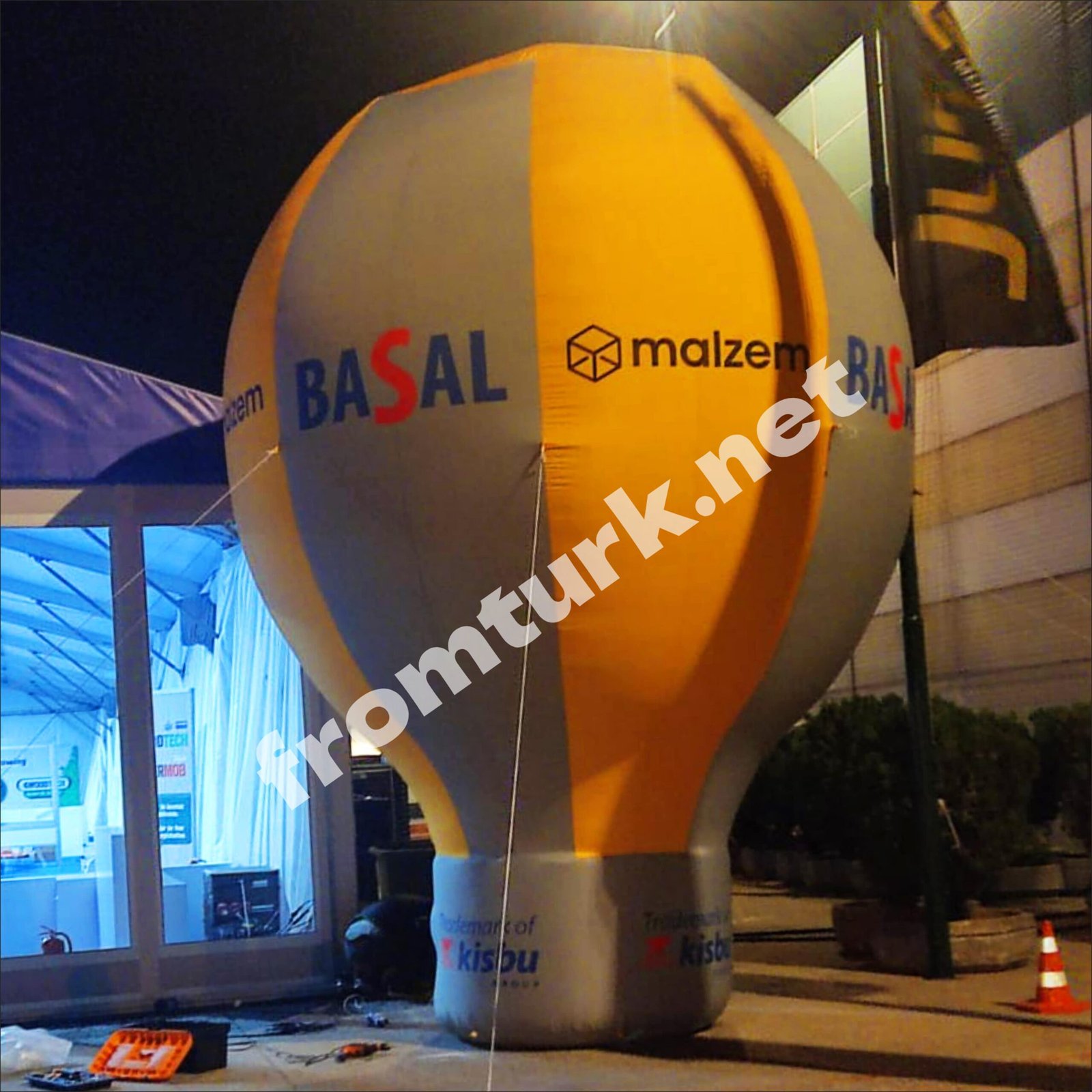 Branded inflatable ground balloon displayed at a corporate event or promotional campaign